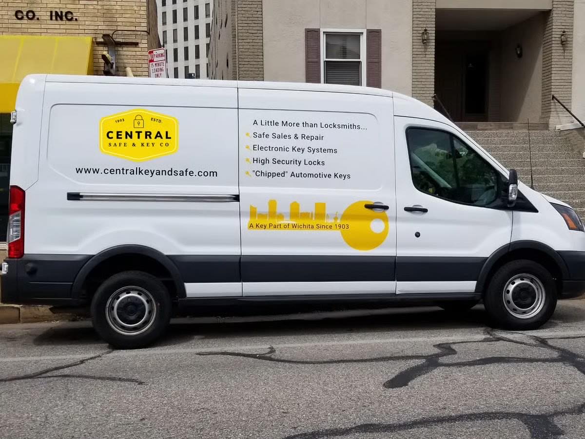 A Central Key & Safe service van outside the Market Street shop, lettered 'A Key Part of Wichita Since 1903'